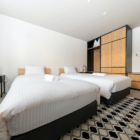 The Moo Bedroom Four with Twin Beds and Side Lamps | Hakuba, Nagano