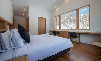 Ro-An Bedroom with Seating Area and View | Hirafu, Niseko