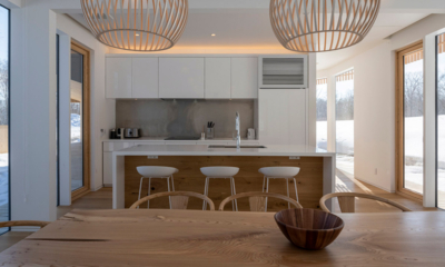 Yukihyo Kitchen and Dining Area with Hanging Lamps | Soga, Niseko