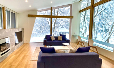 Sanzan Chalet Living Area with Snow View | Echoland, Hakuba