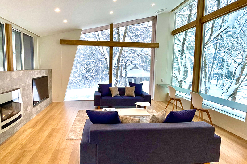 Sanzan Chalet Living Area with Snow View | Echoland, Hakuba