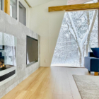 Sanzan Chalet Living Area with Fireplace and Snow View | Echoland, Hakuba