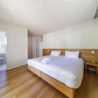 Sanzan Chalet Bedroom and Bathroom One | Echoland, Hakuba