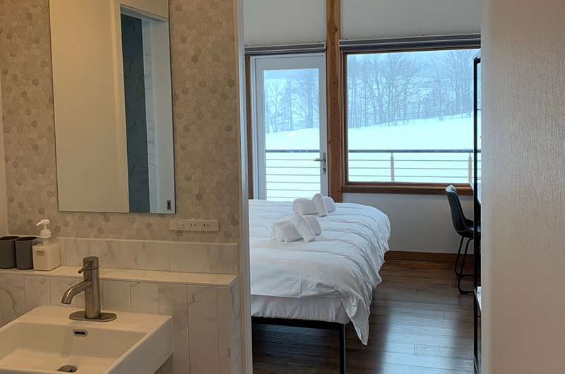 Hakobune Niseko Bedroom and Bathroom with Snow View | Soga, Niseko