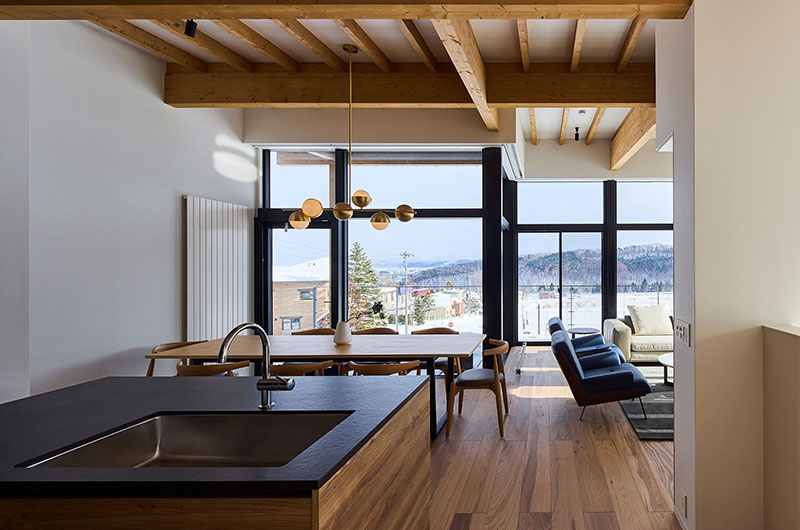 Shiyuki Kitchen and Dining Area with Hanging Light and View | Furano, Hokkaido