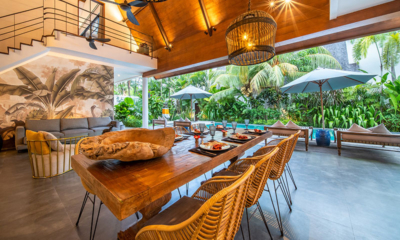 La Residence Anam Living and Dining Area with Hanging Lights and Pool View | Pererenan, Bali