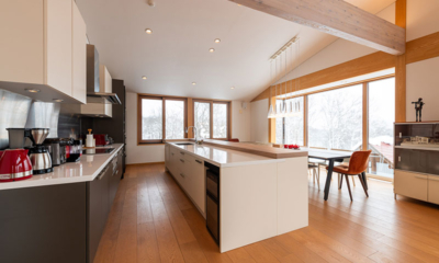Kazane Kitchen and Dining Area with Hanging Lamps | Hirafu, Niseko