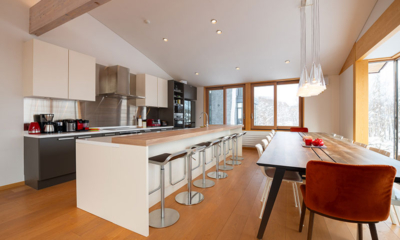 Kazane Kitchen and Dining Area with Hanging Lights | Hirafu, Niseko