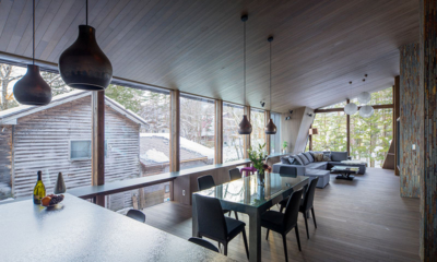 Yotsuba Living, Kitchen and Dining Area with Hanging Lights | Echoland, Hakuba