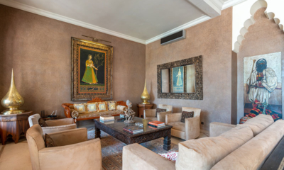 Palais Hassoun Living Area with Paintings | Marrakesh, Morocco