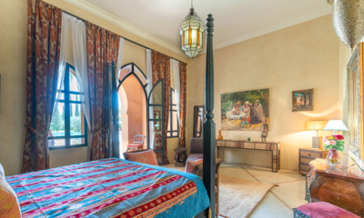 Palais Hassoun Junior Suite Safran Bedroom Five with Paintings | Marrakesh, Morocco