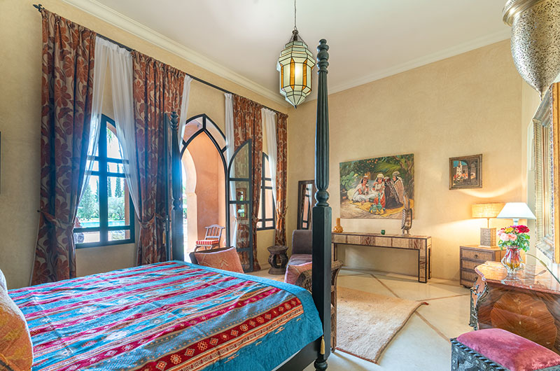 Palais Hassoun Junior Suite Safran Bedroom Five with Paintings | Marrakesh, Morocco