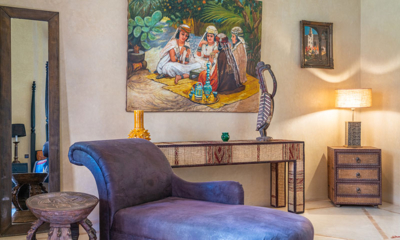 Palais Hassoun Junior Suite Safran Bedroom Five with Seating Area and Paintings | Marrakesh, Morocco