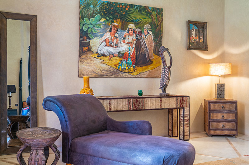 Palais Hassoun Junior Suite Safran Bedroom Five with Seating Area and Paintings | Marrakesh, Morocco