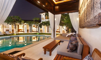 Villa Lenu Pool Side Seating Area at Night | Seminyak, Bali