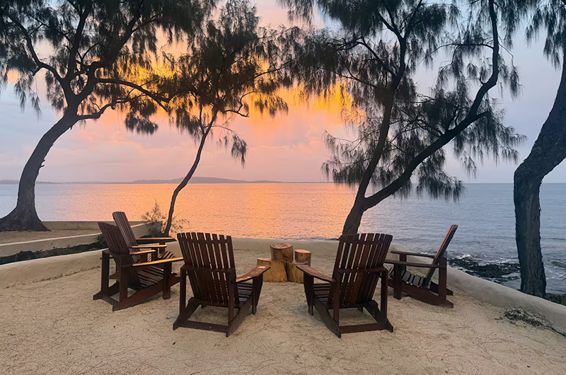 Rockpools Five Adirondack Chairs facing the Sea | Efate, Vanuatu