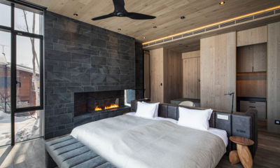 Corniche Hirafu Bedroom One with Fireplace | Hirafu, Niseko