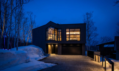 Corniche Hirafu Exterior with Snow at Night | Hirafu, Niseko
