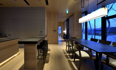 Kamakura Kitchen and Dining Area with View at Night | Hirafu, Niseko