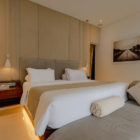 Lataliana Villas Villa Ta Bedroom One with Painting | Seminyak, Bali
