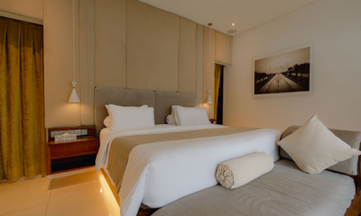 Lataliana Villas Villa Ta Bedroom One with Painting | Seminyak, Bali