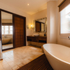 Lataliana Villas Villa Ta Bathroom Three with Bathtub | Seminyak, Bali