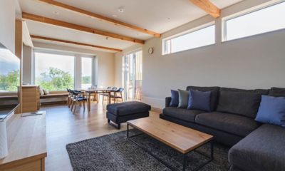 Furano Sanso Indoor Living and Dining Area with View | Furano, Hokkaido