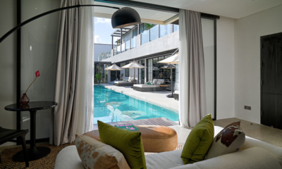 Villa Carpe Diem Bedroom One with Sofa and View | Canggu, Bali