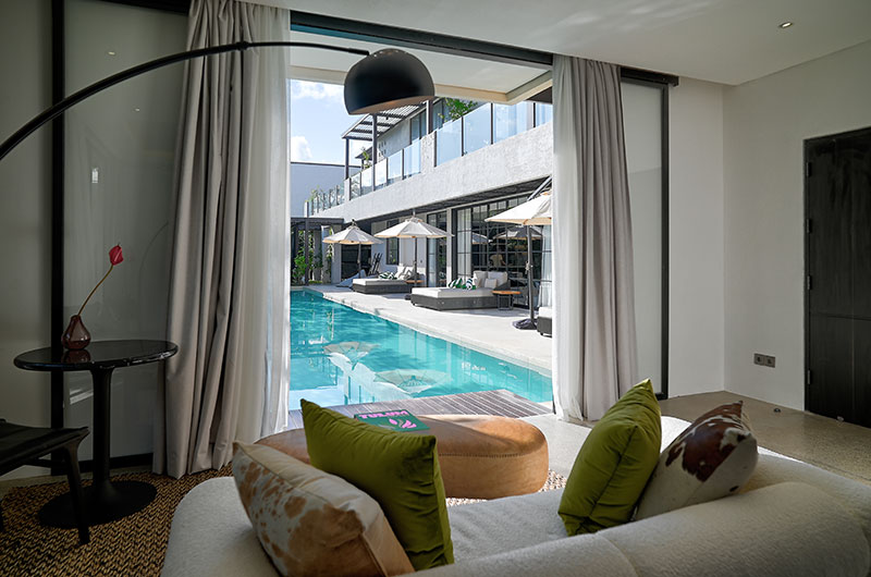 Villa Carpe Diem Bedroom One with Sofa and View | Canggu, Bali