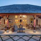 The Suaka Baliaga Pool Side Living and Dining Area at Night | Batubelig, Bali
