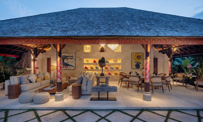 The Suaka Baliaga Pool Side Living and Dining Area at Night | Batubelig, Bali