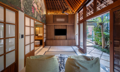 The Suaka Baliaga Bedroom Two and Three Lounge with TV | Batubelig, Bali