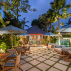 The Suaka Baliaga Pool Side Dining Area at Night | Batubelig, Bali