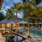 The Suaka Baliaga Pool Side Area at Night | Batubelig, Bali