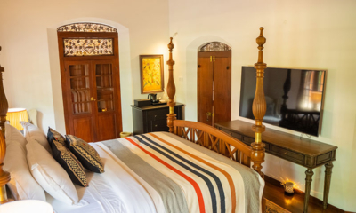 Maya Tangalle Bedroom Two with Four Poster Bed and TV | Tangalle, Sri Lanka