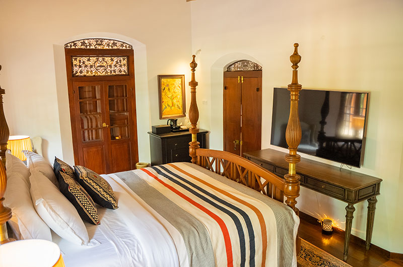 Maya Tangalle Bedroom Two with Four Poster Bed and TV | Tangalle, Sri Lanka